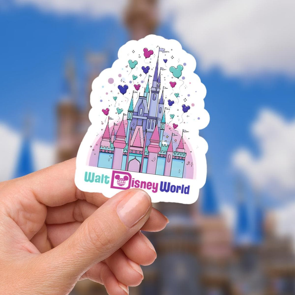 Disney Castle  World Sticker Waterproof Disney Laptop, Disneying Theme Park Vacation, Castle Park Mouse.  A colorful Walt Disney World sticker featuring Cinderella's castle. The castle is depicted in shades of pink, blue, and purple with green accents. The sticker includes heart-shaped and Mickey Mouse head-shaped decorations. The words 'Walt Disney World' are written in blue and white.