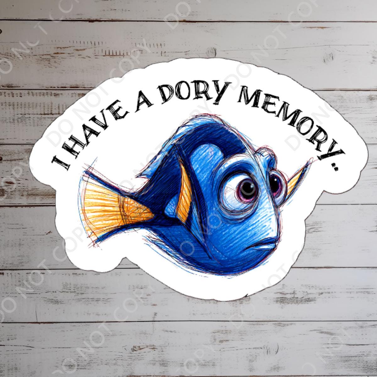 A sticker featuring Dory from Finding Nemo. The blue fish has large eyes and a yellow tail. The sticker has the text 'I have a Dory memory' in a curved white banner. The background is a blurred image of a castle and blue sky.