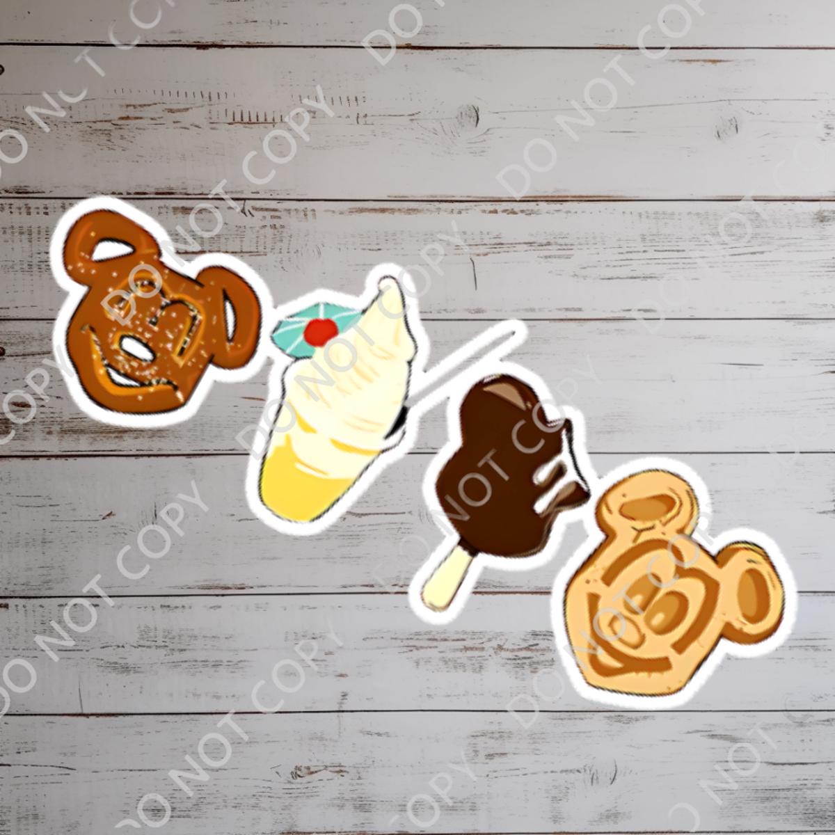 Disney Snacks, What A Wonderful World Sticker Waterproof Disney Laptop, Disneying Theme Park Vacation, Castle Park Mouse There's a Mickey Mouse pretzel, a soft-serve ice cream cone with a cherry, a chocolate-covered ice cream bar, and a Mickey Mouse waffle.