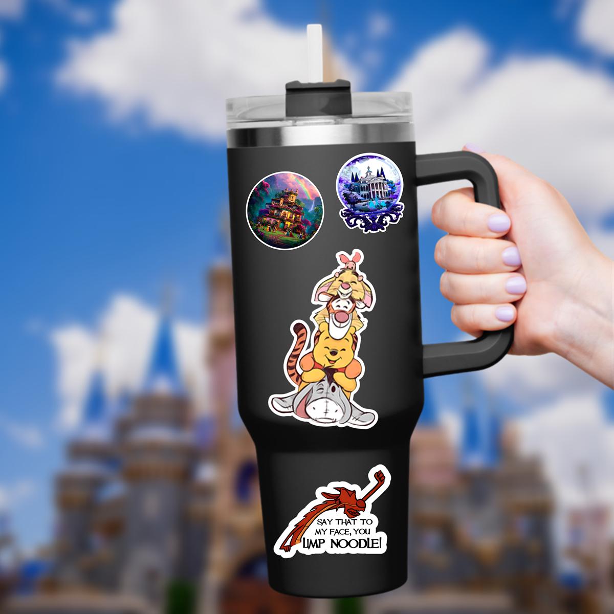 Disneyy  Winnie The Pooh Disney Laptop Sticker Positive Affirmation planner stationery decal water bottle cell  A colorful sticker featuring Winnie the Pooh characters. Eeyore is at the bottom, supporting Winnie the Pooh, who is supporting Tigger, who is supporting Piglet. The sticker is held by a hand in front of a blurred background of a blue sky and a castle.